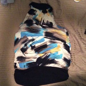 Sleeves, open backed multi color top