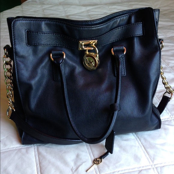 Black Michael Kors Hamilton with gold hardware