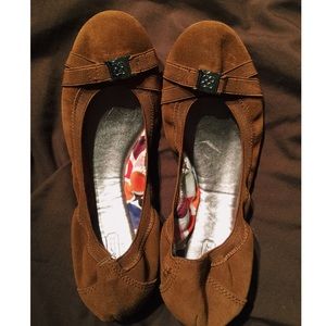 Brown coach flats