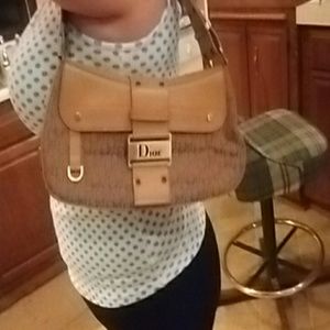 Purse CHRISTIAN DIOR / hair extensions