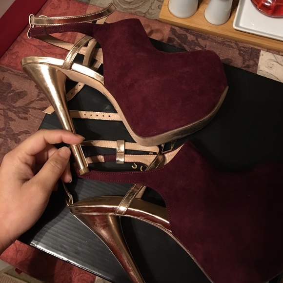 Burgundy and gold pumps