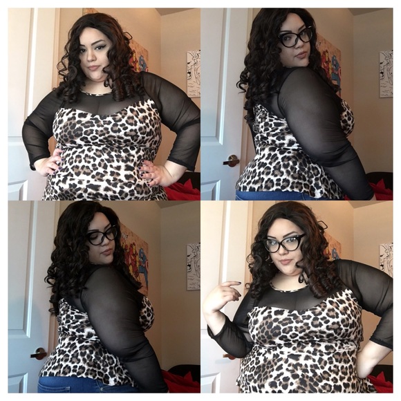 Leopard print hourglass shaped top sheer sleeves.