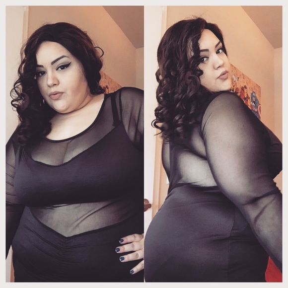 Black dress with sheer sleeves and mid section