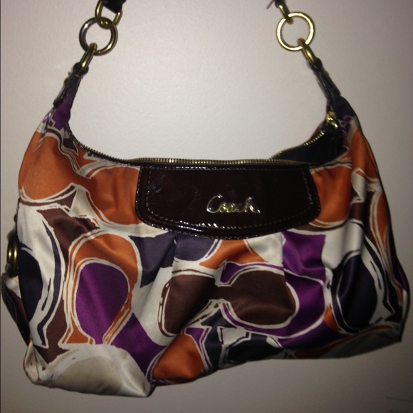 Coach purse, could use a good wash.