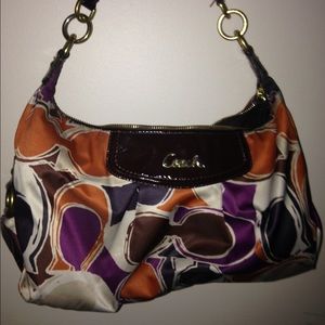 Coach purse, could use a good wash.