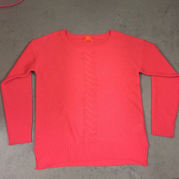 Oversized pink knit sweater with braided detail