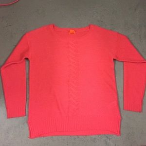 Oversized pink knit sweater with braided detail