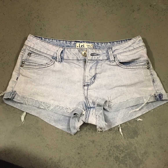 Lightwash purple shorts with dark purple stitching
