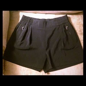 Jennifer Lopez black dress shirts. Size medium.