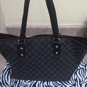 Gucci. authentic. small blemish in last pic