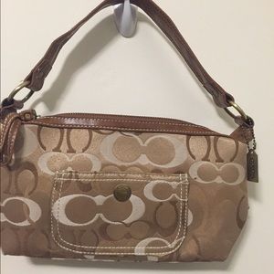 Small barley used coach handbag!