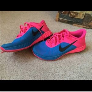 Super cute hot pink and blue nikes