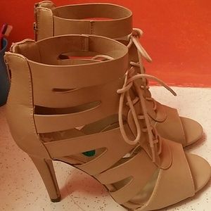 Lace up caged peep toe heel