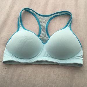 Light blue lacy padded VS pink sports bra