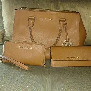 MK purse, wallet and wristlet.