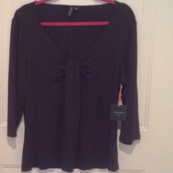 Black top with a tie look attached in the center