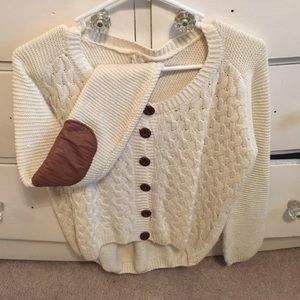 Cream sweater with elbow patches