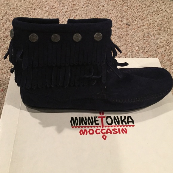 Size 9 Minnetonka Moccasin navy bootie. Never worn