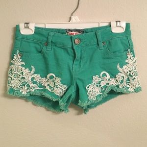 Mint shorts with white lace pattern
