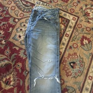 Distressed men's express jeans