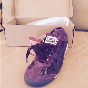 Asics Onitsuka Tiger shoes with snakeskin print.