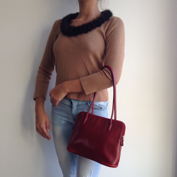 Michelle Nicole sweater with red hand bag