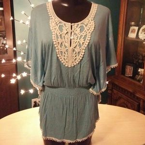 Adorable Blue Blouse with embroidered neckline