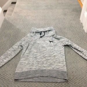 Turtle neck sweatshirt.