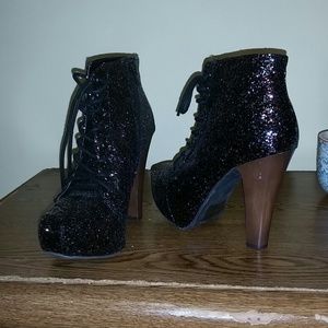 Used black with glitter heels