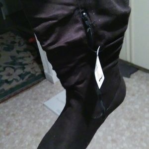 Brand new with tags size 8 black boots.