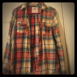 Women's plaid orange, red, yellow, shirt.