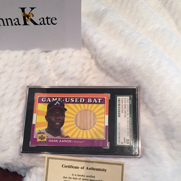 Hank Aaron baseball card in case.coa