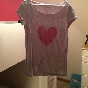 Short sleeve. "Wild at ❤️"