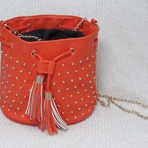 Orange studded/jeweled bucket cross body