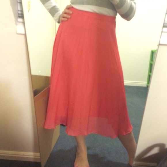 Over the knee salmon pleated skirt