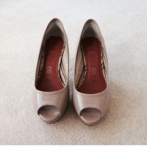 Nude peep toe pumps