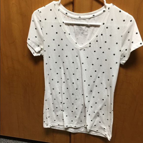 White polka dot shirt