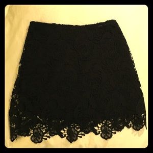 Black lace mini skirt