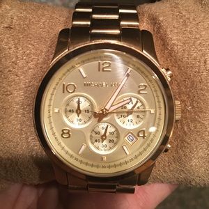 Gold Michael Kors watch (woman's)