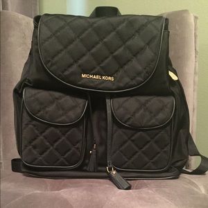 Michael Kors quilted nylon large flap backpack