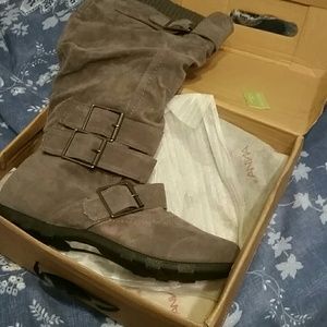 New slouch buckle gray boots. Never worn. Too smal
