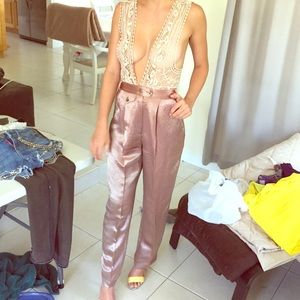 Chic silk pants paired with sheer vest