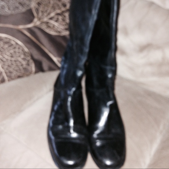 Full length boots to right below knee