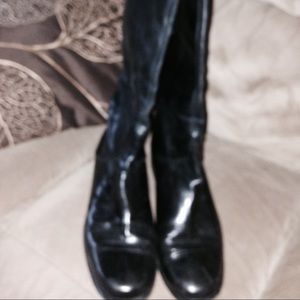 Full length boots to right below knee