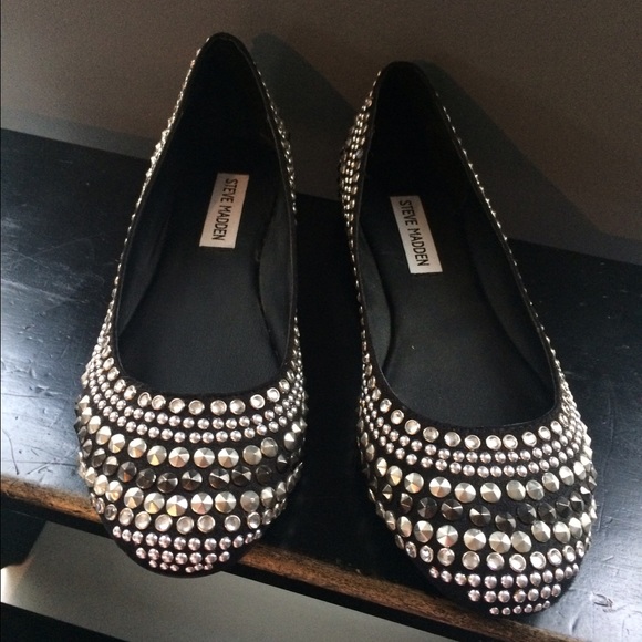 Black Steve Madden flats w/ silver and gold studs.