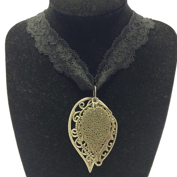 Leaf motif filigree pendant on lace black necklace