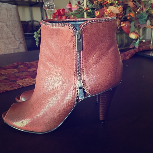 Nine West peep toe boots. Excellent condition.