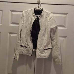 White leather jacket with black zippers