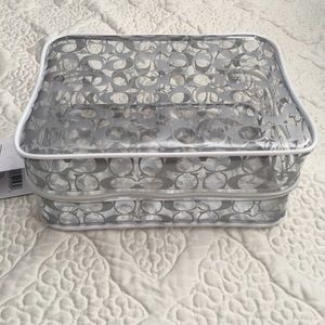 Brand new with tags Authentic Coach makeup bag