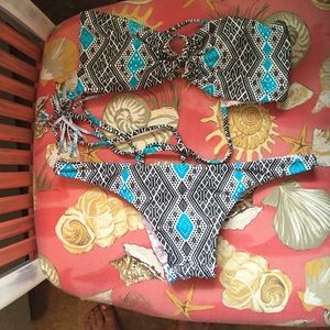 SOLD  💜Acacia swim suit two piece.